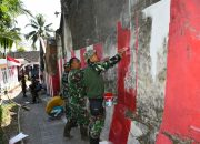 Serba Merah Putih Yang Dilakukan Danpos Dan Babinsa di Kampung Pancasila