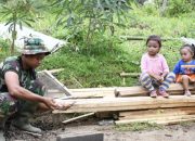 Keceriaan Anak-Anak Saat Bermain Dengan TNI Satgas TMMD 123